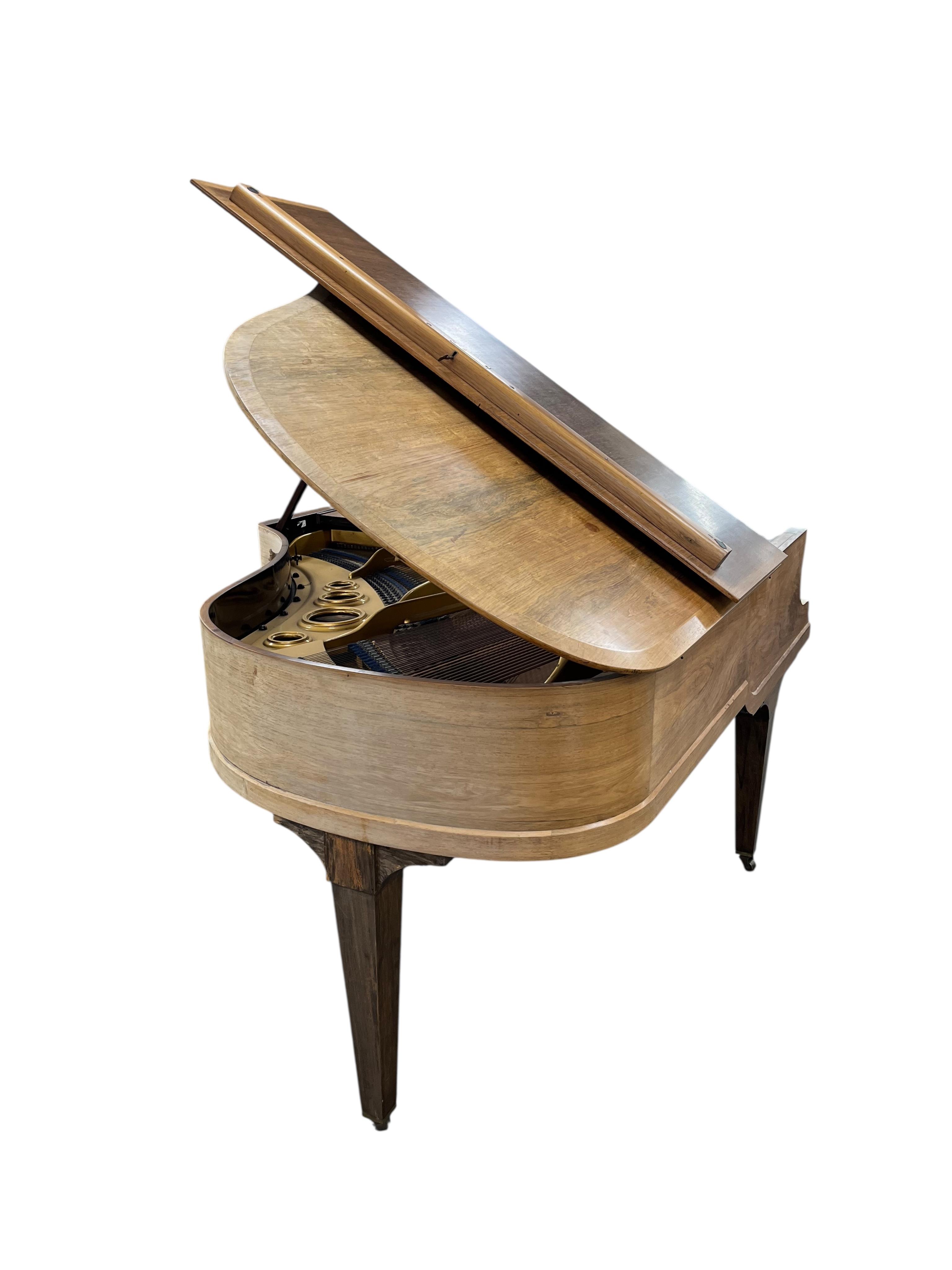 A Bluthner faded rosewood baby grand piano circa 1914, 176cm together with an adjustable piano stool. CITES Submission reference HWK4RNUW